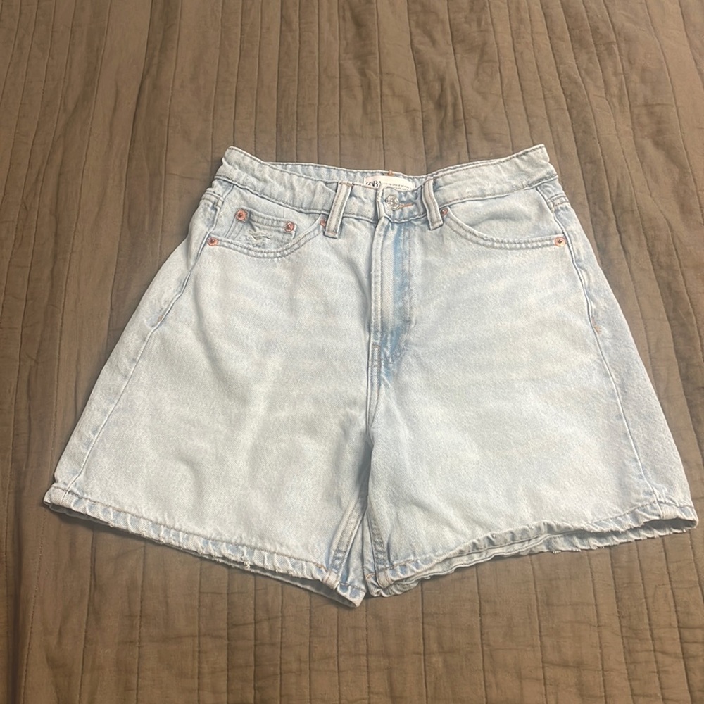 Light wash Zara shorts.